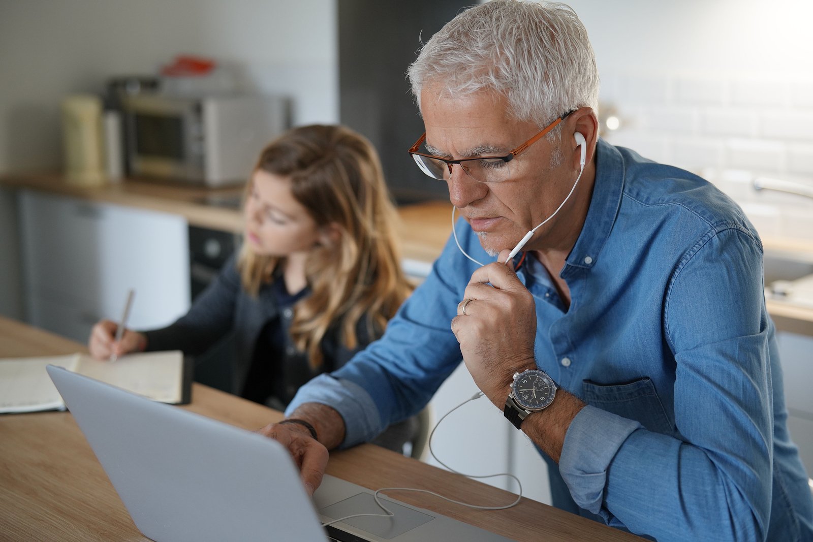 bigstock-Father-and-school-girl-working-356275736